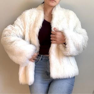 White faux fur coat